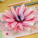 Carte pop-up fleur avec papillon