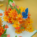 Carte pop-up Marguerites colorées avec papillons